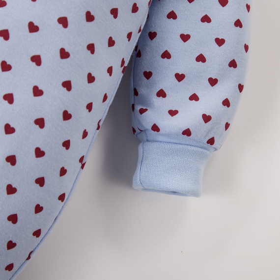 Pelele recién nacido Love Eevi azul con corazones 100% algodón con mangas plegables