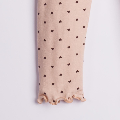 226202 Nicol HANIA Leggings infantiles de algodón beige con corazones