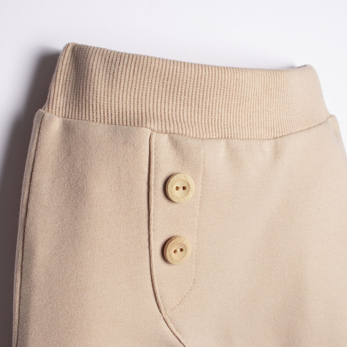 221273 Kiku Nicol pantalones de chándal beige para bebé con botones