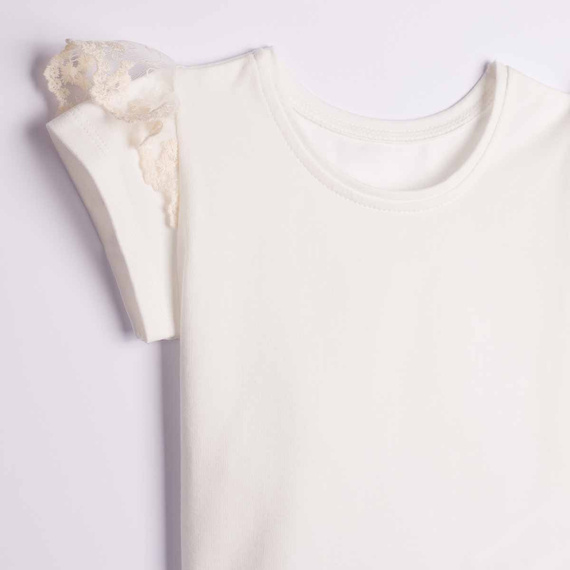 163850 Nicol Blusa cremosa para niña con mariposa de encaje y manga farol