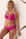 Sujetador fucsia.