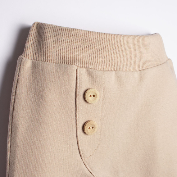 221273 Kiku Nicol pantalones de chándal beige para bebé con botones
